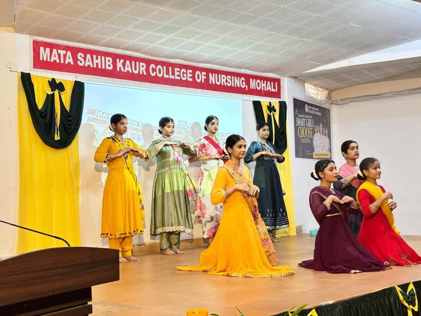 Students performing a dance on stage at MSK College