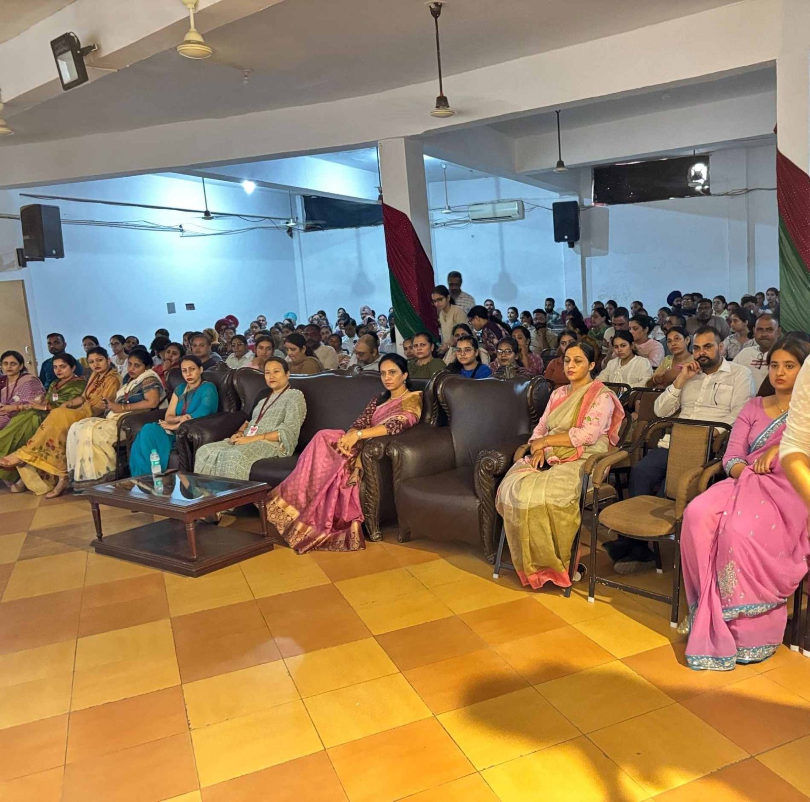 Parents talking with the college team after Orientation Day